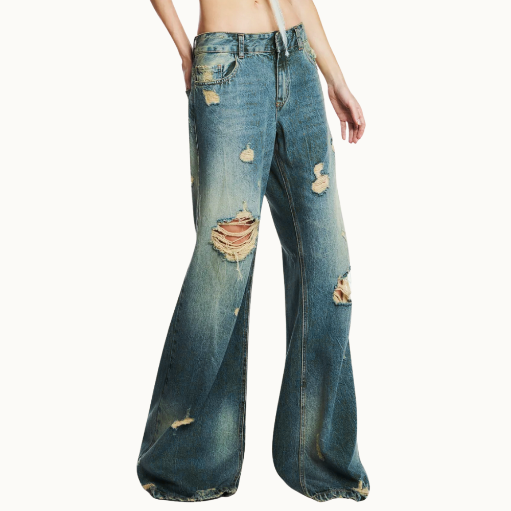 CALÇA JEANS AMARELADA RASGOS FLARE CINTURA BAIXA