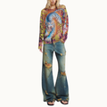 CALÇA JEANS AMARELADA RASGOS FLARE CINTURA BAIXA