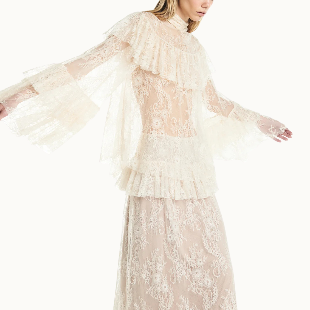 BLUSA GOLA ALTA BABADOS