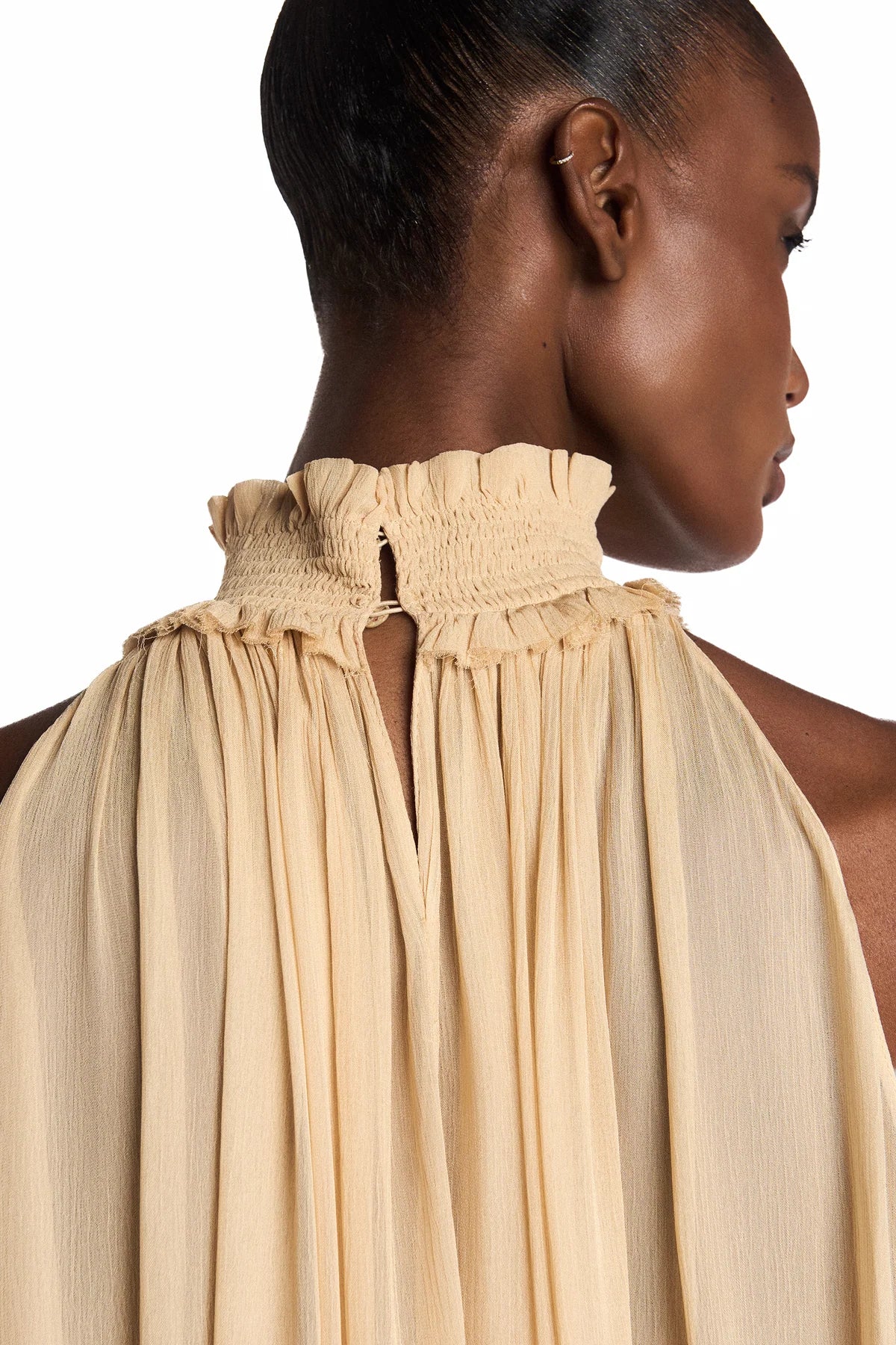 BLUSA SEM MANGA GOLA ALTA BABADOS BARRA CHIFFON AMARELO