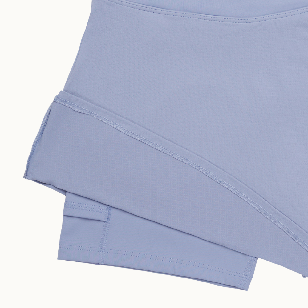 SAIA ESPORTIVA COM SHORT DE MALHA INTEGRADO